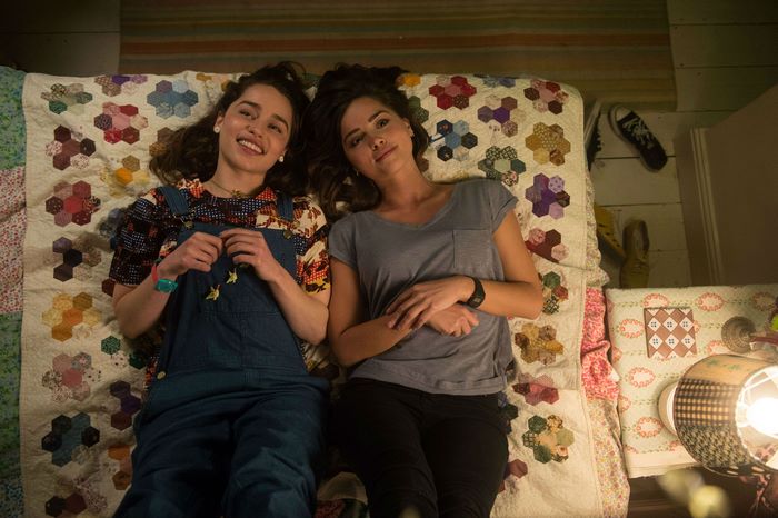 Jenna Coleman lying on a quilt