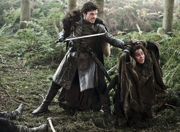 Robb Stark from Game of Thrones fighting in a forest