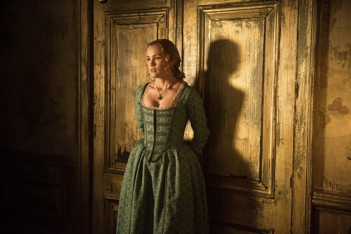 Hannah New in a green dress