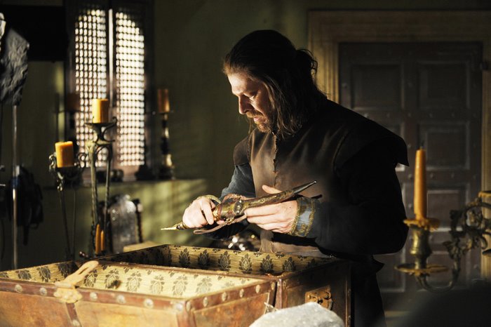 Sean Bean examining a dagger