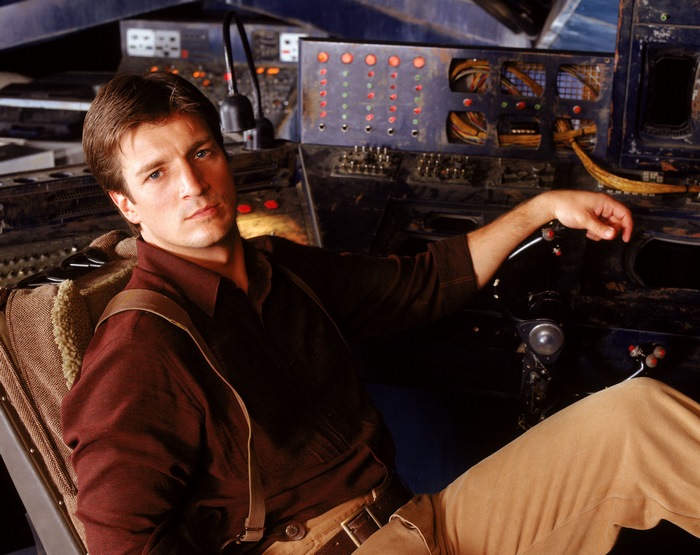 Nathan Fillion in a spaceship cockpit
