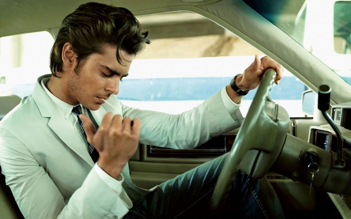 Zac Efron in a car