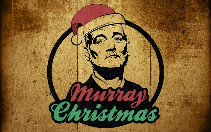 Bill Murray wearing a Santa hat with "Murray Christmas" text