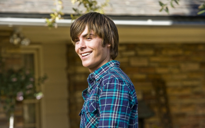 Zac Efron smiling outdoors
