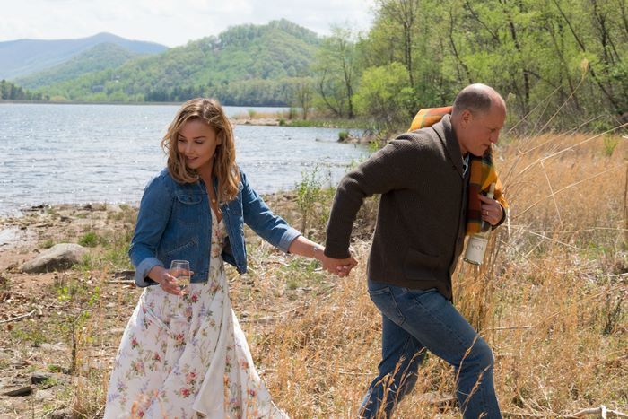Abbie Cornish and Woody Harrelson walking by a lake
