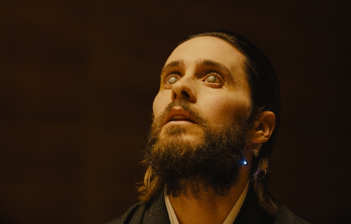 Jared Leto with white eyes and blue earring