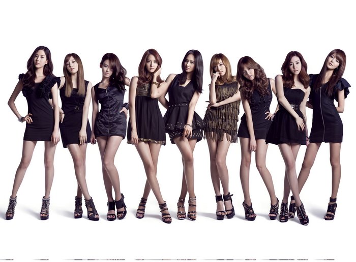 Girls Generation members in black dresses