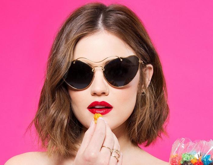 Lucy Hale eating candy