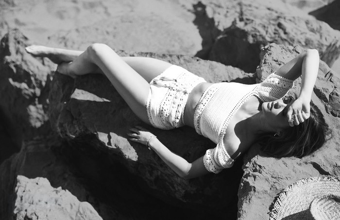Lucy Hale on rocks