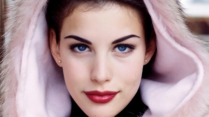 Liv Tyler in a pink fur-lined hood