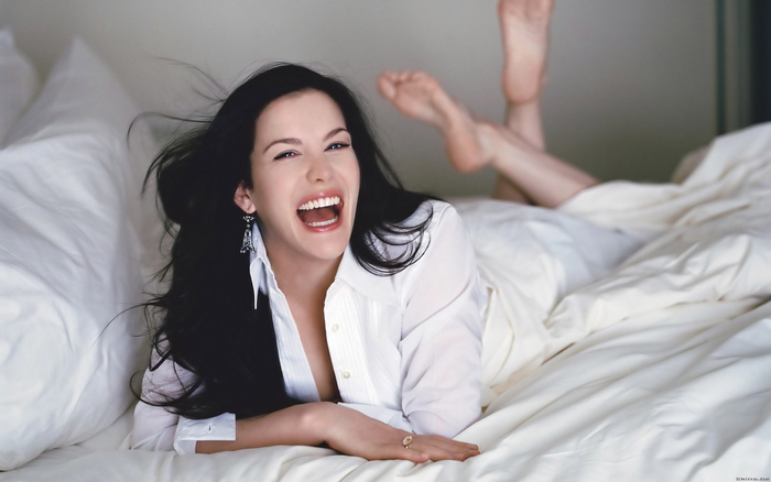 Liv Tyler on a bed