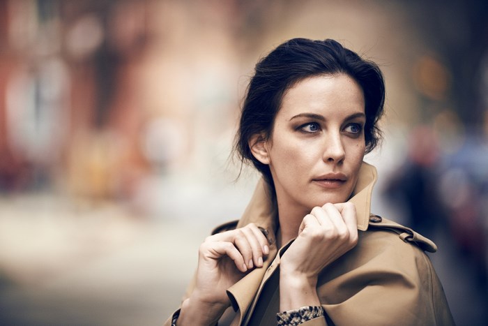 Liv Tyler in a tan trench coat