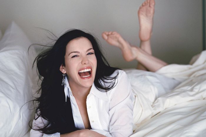 Liv Tyler on a bed