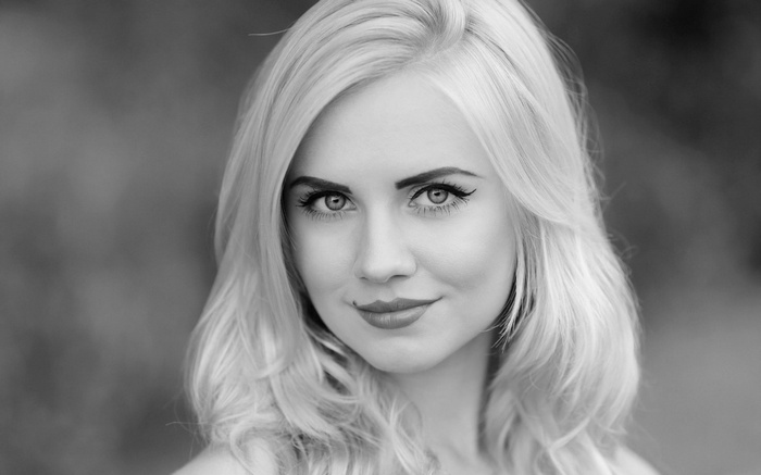 Black and white portrait of a blonde woman