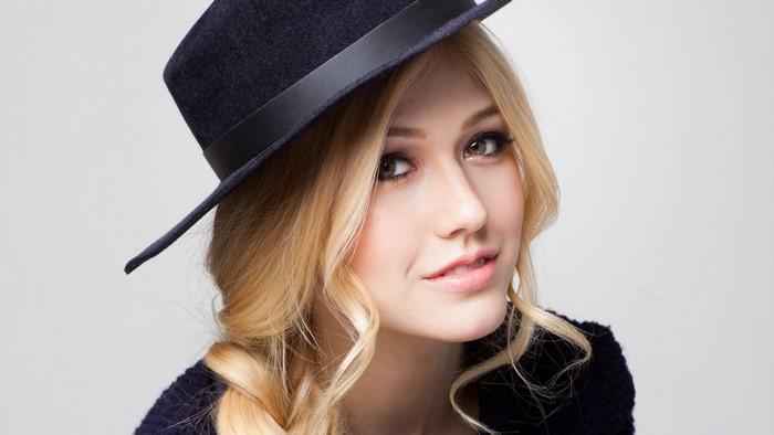 Katherine McNamara wearing a hat