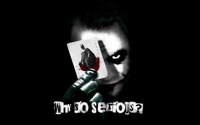 The Joker from The Dark Knight holding a card