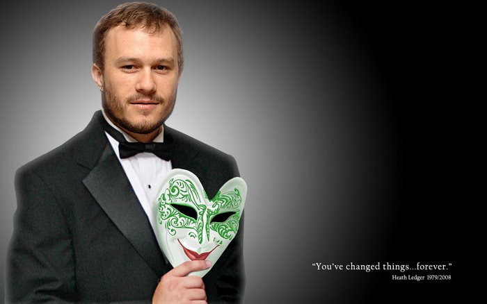 Heath Ledger holding a mask