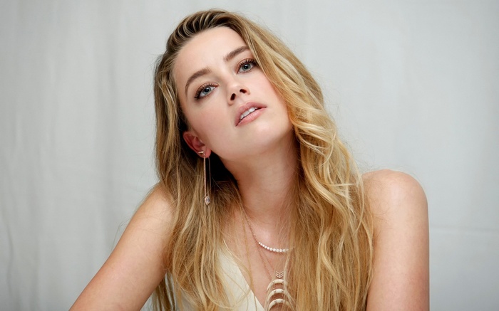 Amber Heard posing for a photo