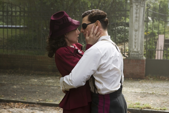 Carice van Houten in a romantic embrace