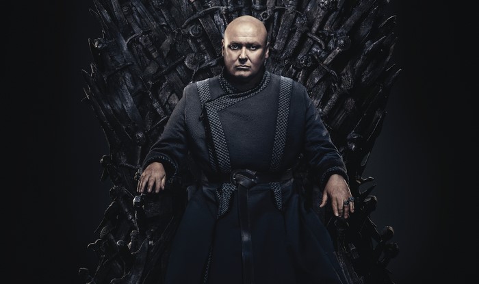 Conleth Hill as Varys on the Iron Throne