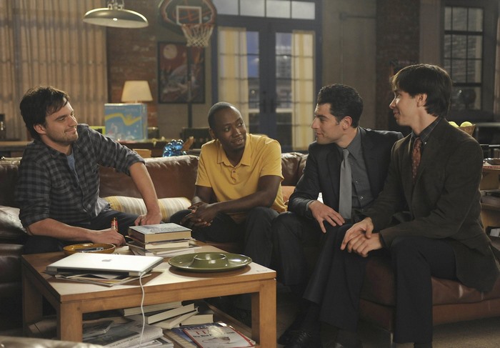 Lamorne Morris and friends in a living room