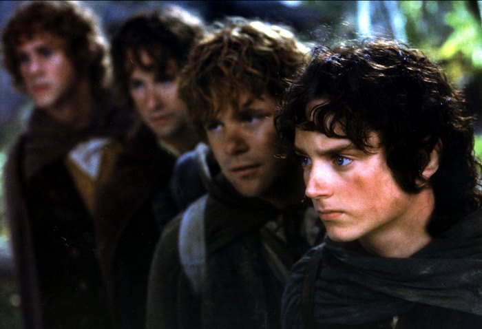 Elijah Wood and hobbits from The Lord of the Rings