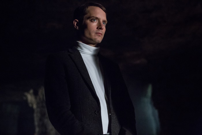 Elijah Wood in a dark setting