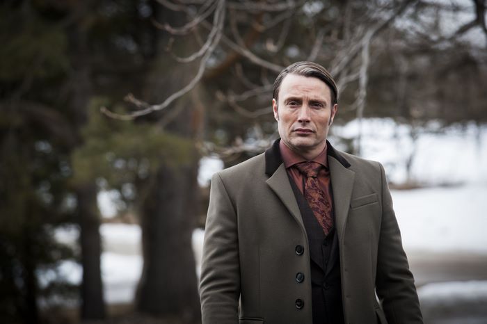 Mads Mikkelsen in a suit outdoors