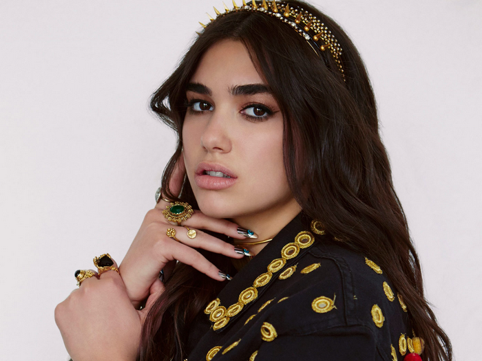 Dua Lipa wearing a crown and jewelry