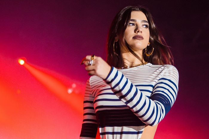 Dua Lipa performing on stage