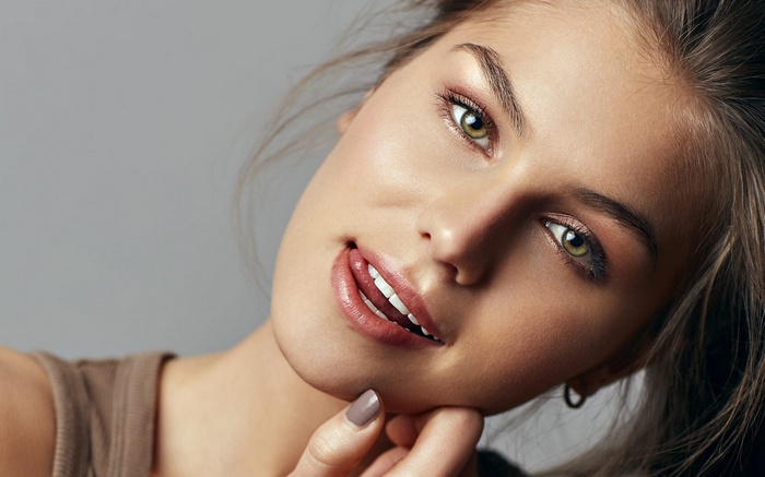 Woman with green eyes and makeup