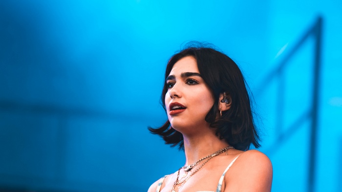Dua Lipa performing on stage