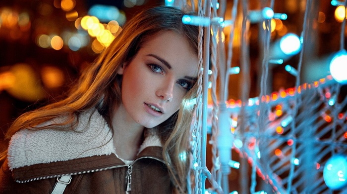 Woman with blue and orange lights