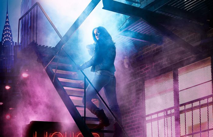 Krysten Ritter on a fire escape