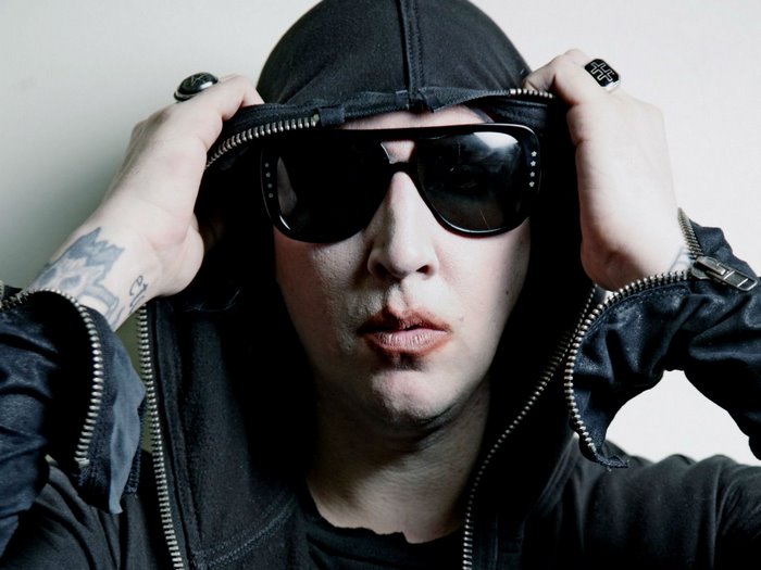 Marilyn Manson wearing sunglasses and hoodie