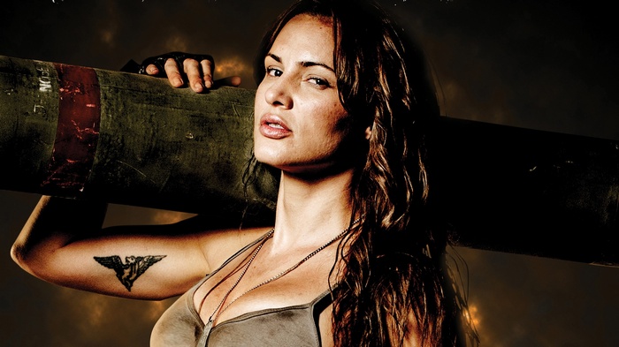 Woman holding a missile launcher