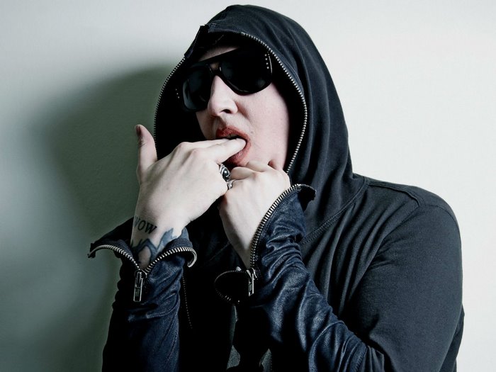 Marilyn Manson wearing sunglasses and hoodie