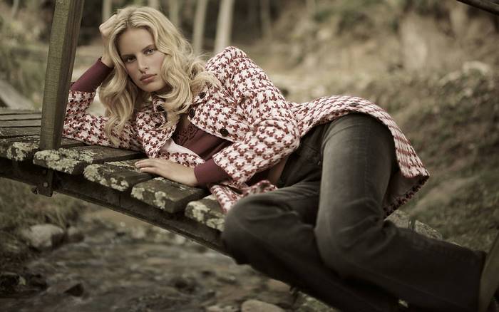 Karolina Kurkova on a wooden bridge
