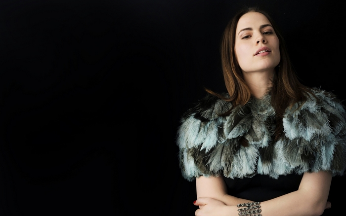Hayley Atwell wearing a feather cape