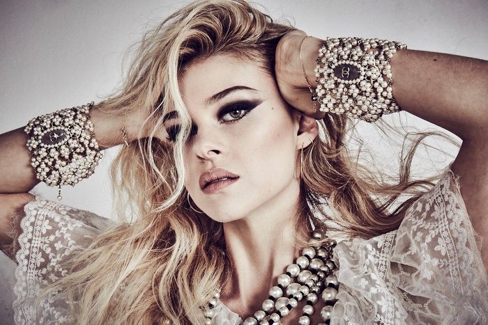 Nicola Peltz with pearl jewelry