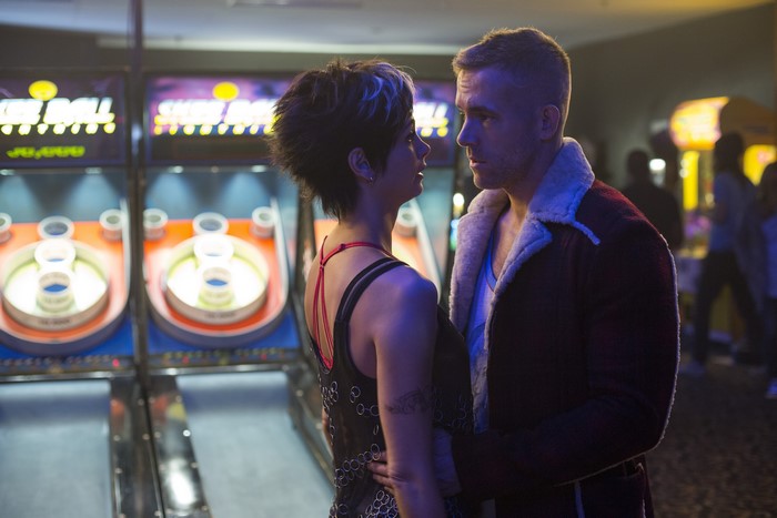 Morena Baccarin and Ryan Reynolds in an arcade