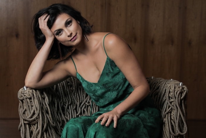Morena Baccarin in a green dress