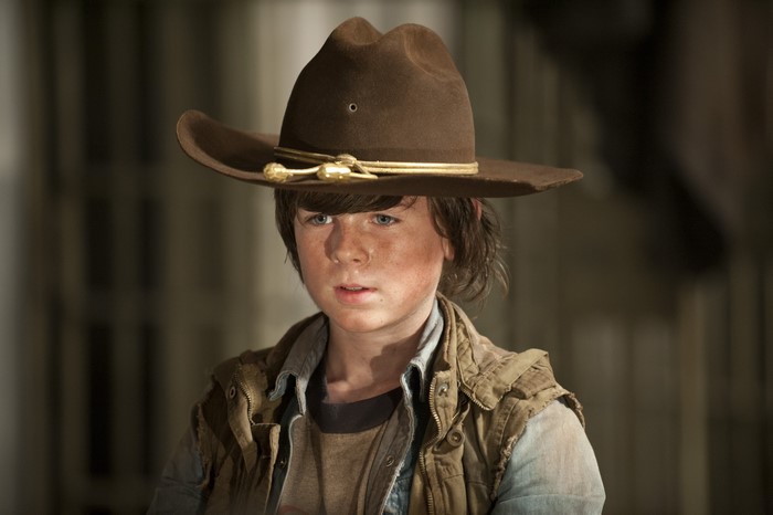 Chandler Riggs as Carl Grimes from The Walking Dead