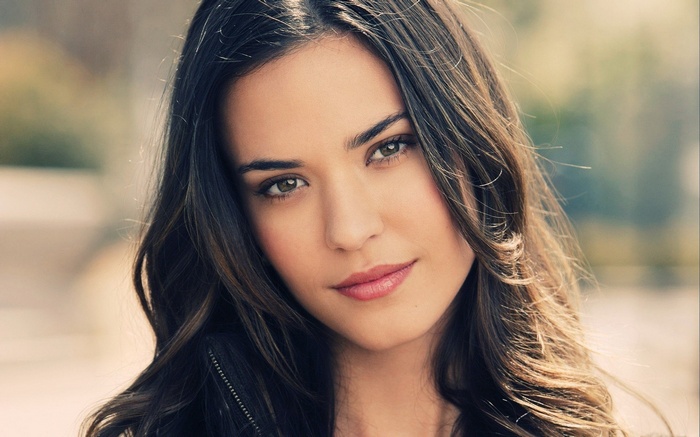 Portrait of a young woman with brown hair