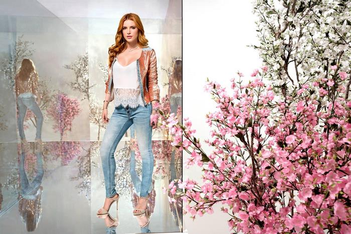 Bella Thorne in sequined jacket and jeans