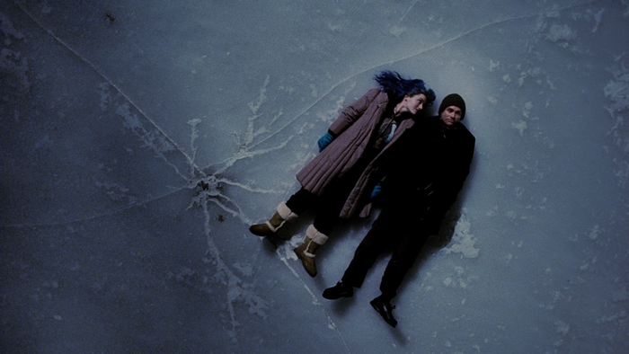 Jim Carrey and Kate Winslet lying on ice