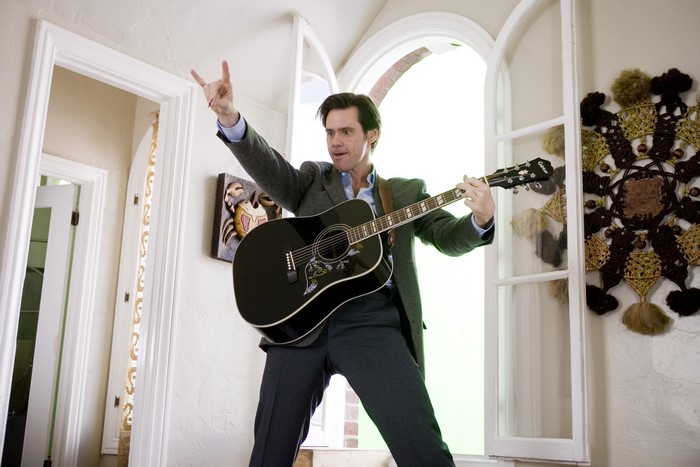 Jim Carrey playing guitar