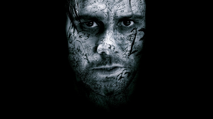 Jim Carrey with numbers on face