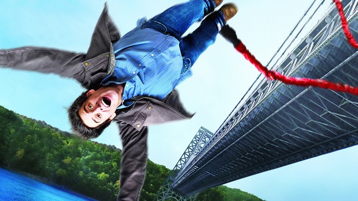 Jim Carrey bungee jumping from a bridge