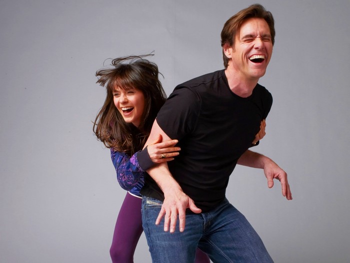 Jim Carrey and a woman laughing